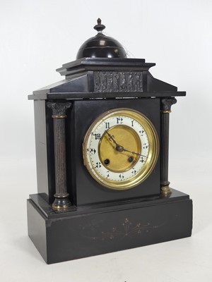 Lot 94 - A 19th century black slate mantel clock of...