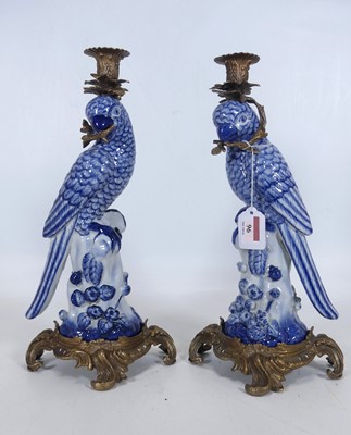 Lot 96 - A pair of metal mounted porcelain table...