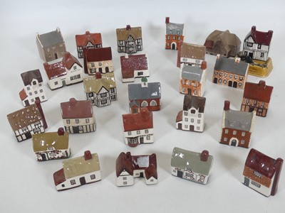 Lot 121 - A group of Mudlen pottery cottages
