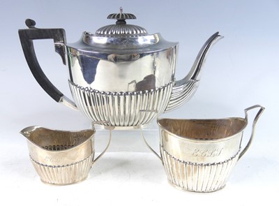 Lot 2144 - A Victorian silver harlequin three-piece tea...