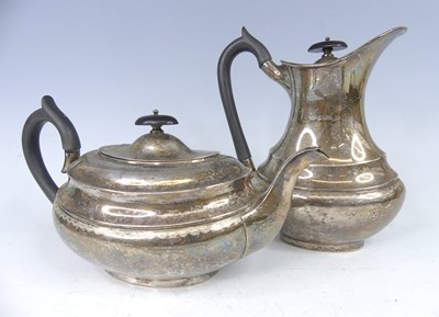 Lot 2148 - An Elizabeth II silver two-piece tea set,...