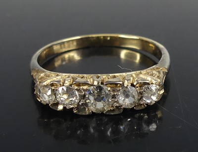 Lot 2554 - A yellow metal diamond five-stone half...