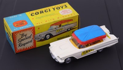Lot 1221 - Corgi Toys, 430 Bermuda Taxi, white body with...