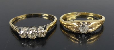 Lot 2562 - Two rings, being a yellow metal diamond...