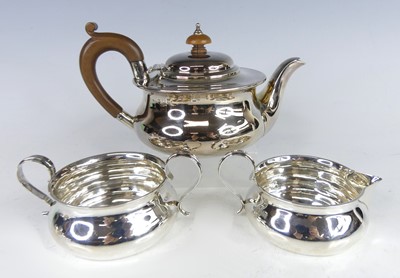 Lot 2147 - A George V silver three-piece teaset,...
