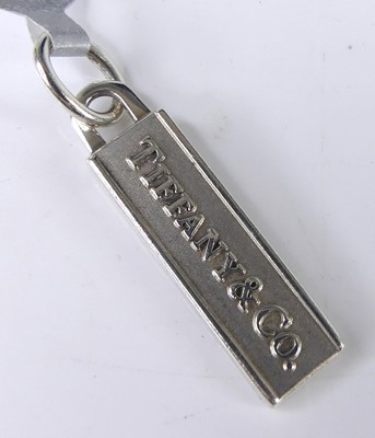 Lot 2645 - A silver Tiffany & Co rectangular tag pendant,...