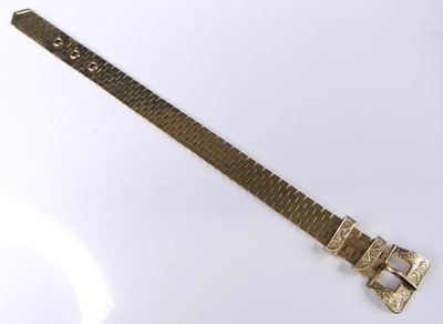 Lot 2658 - A 9ct yellow gold belt style bracelet, with...