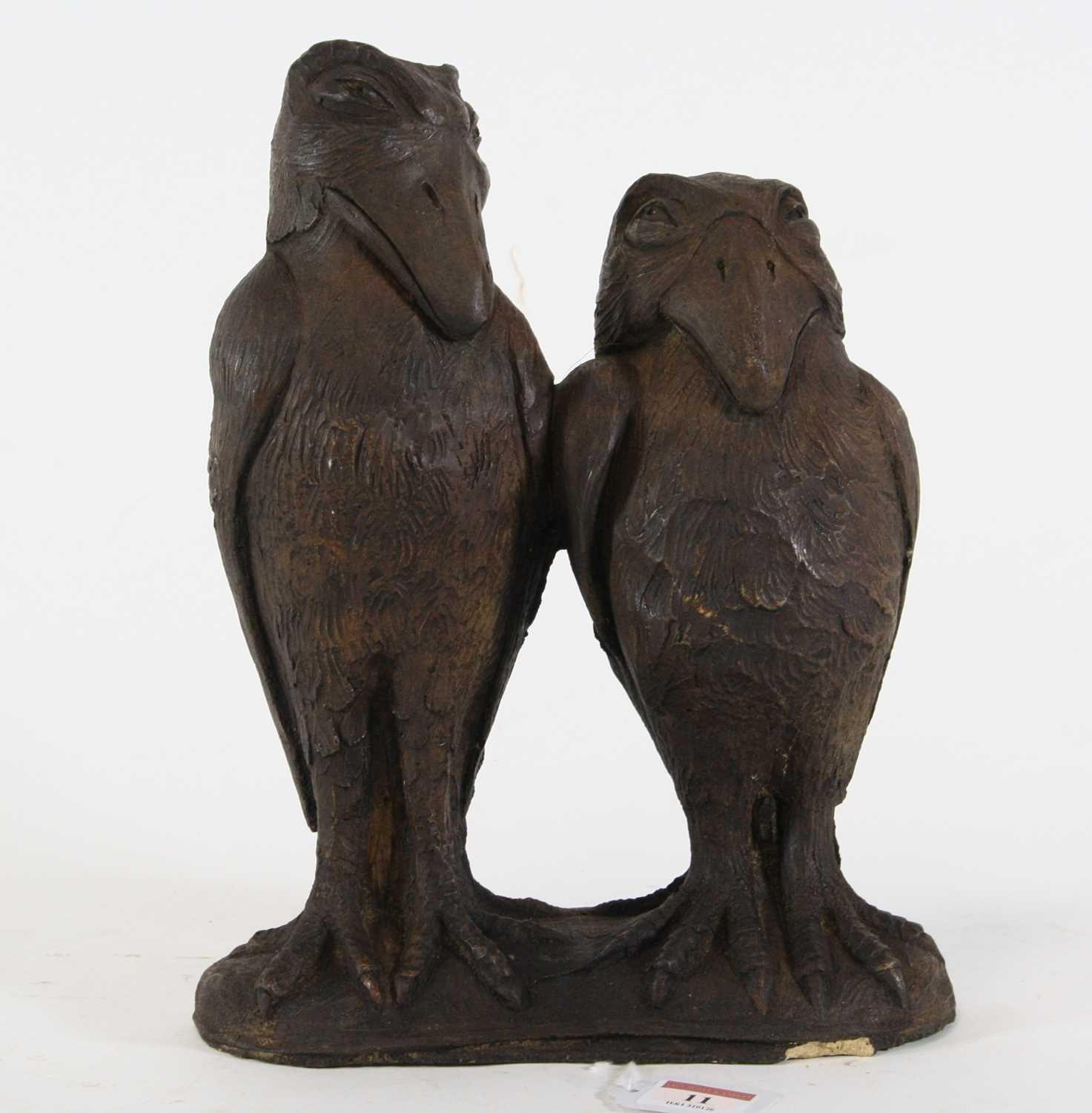 Lot 11 - A painted stoneware figure group of two...