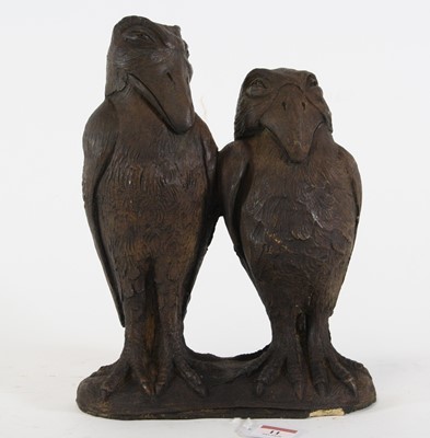 Lot 11 - A painted stoneware figure group of two...