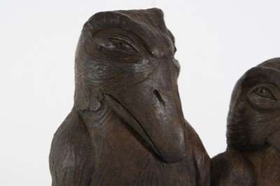 Lot 11 - A painted stoneware figure group of two...