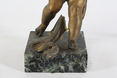 Lot 17 - An early 20th century gilt painted spelter...