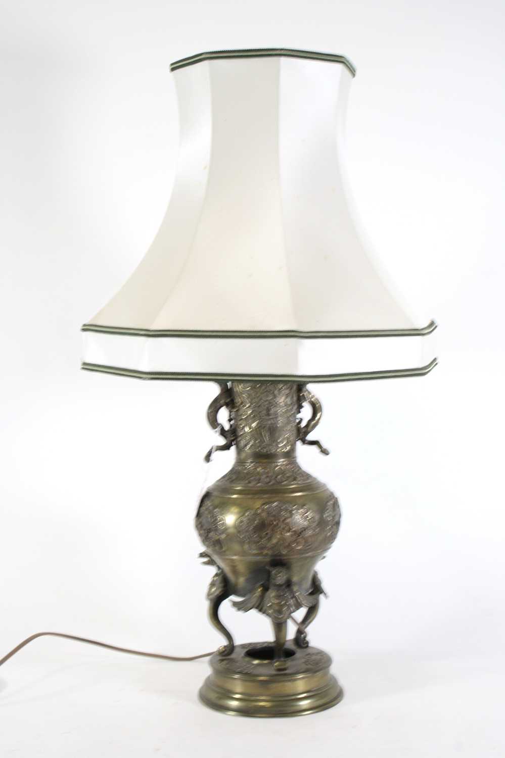 Lot 23 - A Japanese brass vase, with applied dragon...