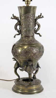Lot 23 - A Japanese brass vase, with applied dragon...