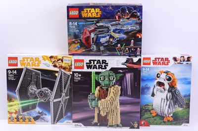 Lot 86 - Lego Star Wars Disney group of four sets to...