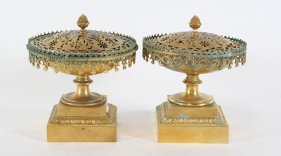 Lot 31 - A pair of gilt metal censers, each having a...