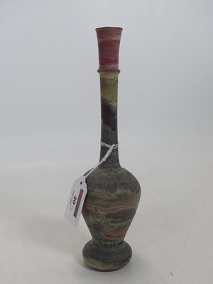 Lot 40 - A Roman style glass bottle vase, together with...