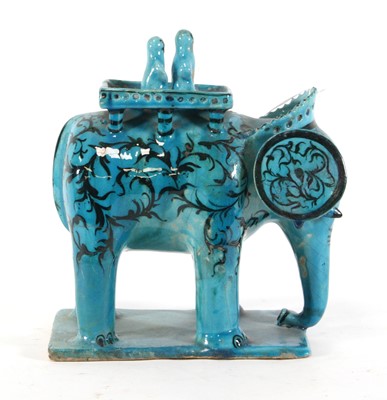 Lot 46 - An Ottoman style turquoise glazed earthenware...