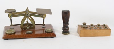 Lot 47 - A set of late 19th century brass postal scales,...