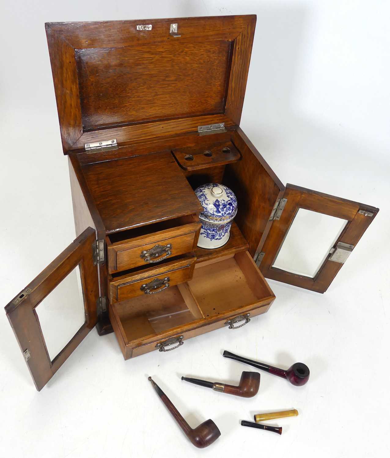 Lot 95 - A Victorian oak smoker's cabinet, having a...