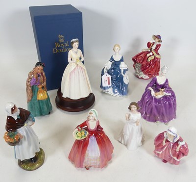 Lot 97 - A collection of Royal Doulton figures of...