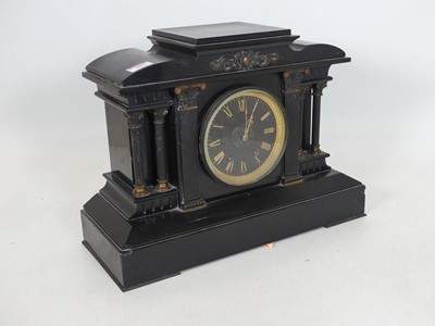Lot 107 - A late 19th century black slate mantel clock,...