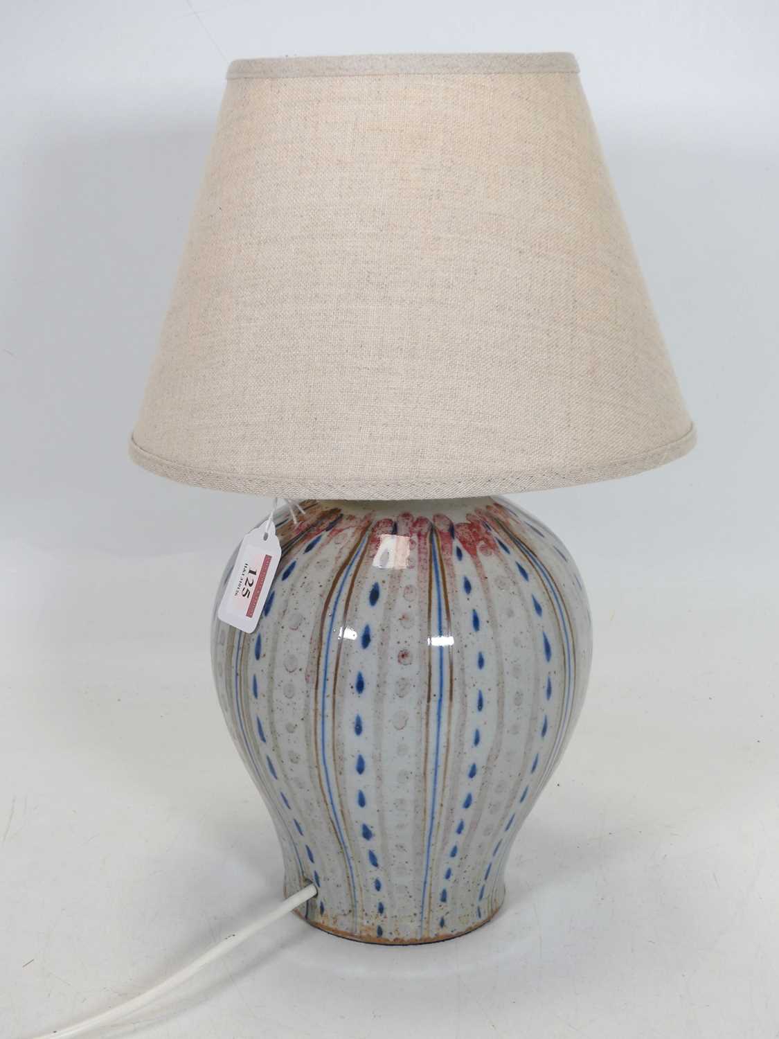 Lot 125 - A 20th century studio pottery table lamp, of...