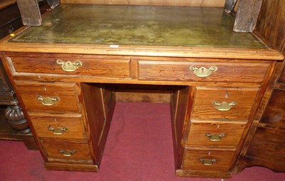 Lot 1229 - A late Victorian pitch pine round cornered...