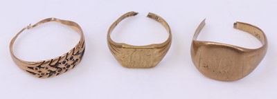 Lot 379 - Three various 9ct gold rings, all being cut...