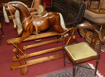 Lot 1278 - A contemporary carved and stained hardwood...
