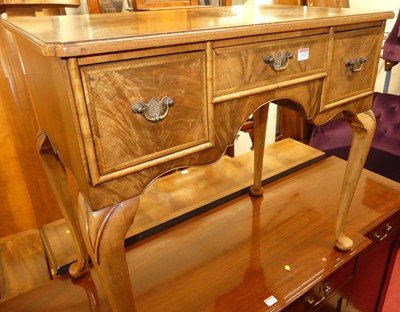 Lot 1322 - A Queen Anne style walnut feather and...