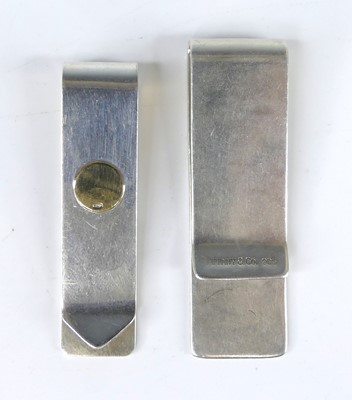 Lot 385 - Two Tiffany & Co silver money-clips, the...