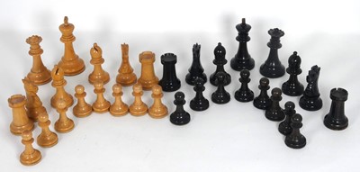 Lot 382 - A boxwood and ebony chess set in the Staunton...