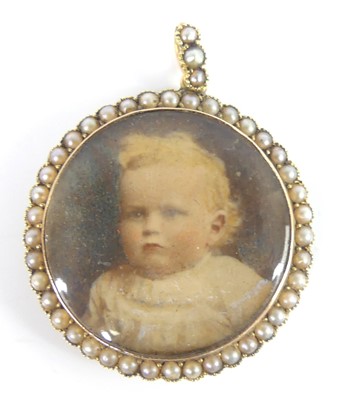 Lot 2166 - An Edwardian yellow metal circular portrait...