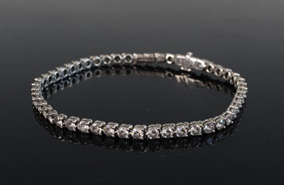 Lot 2236 - A Harry Winston platinum diamond tennis...
