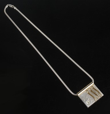 Lot 2063 - A silver and yellow metal rectangular diamond...