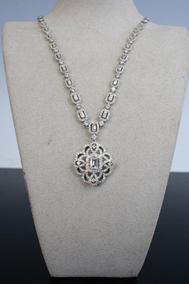 Lot 2239 - A white metal diamond cluster necklace,...