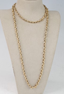 Lot 2223 - A 9ct yellow gold long guard chain, with...