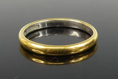 Lot 2194 - A yellow and white metal 2.55mm court shaped...