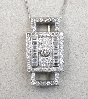 Lot 2238 - An Art Deco white metal panel brooch/pendant,...