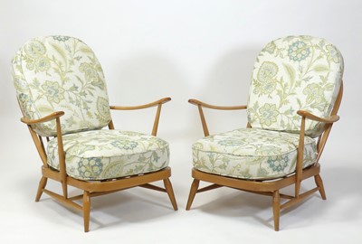 Lot 403 - An Ercol blond beech stickback lounge suite,...