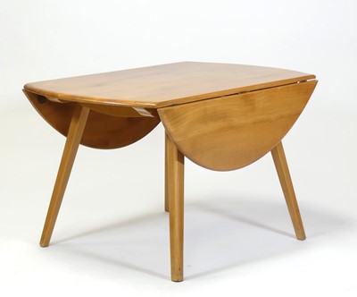 Lot 404 - An Ercol blond elm and beech drop-flap...