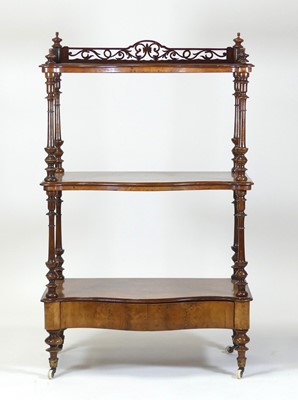 Lot 2436 - A Victorian burr walnut three-tier whatnot, of...
