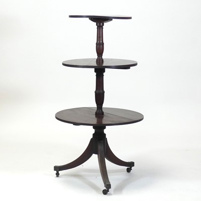 Lot 2454 - A Regency mahogany three-tier dumb waiter, the...