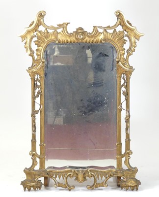 Lot 2448 - A mid-18th century carved giltwood pier glass,...