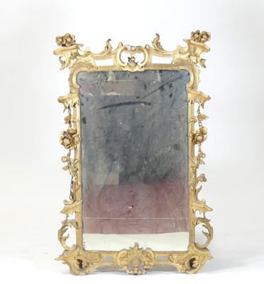 Lot 2406 - An 18th century giltwood and gesso wall mirror...