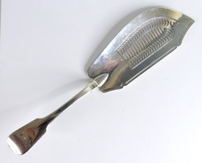 Lot 2101 - A George IV silver fish slice, in the Fiddle...