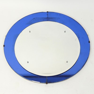 Lot 397 - An Art Deco circular two-tone wall mirror, the...