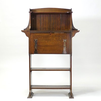 Lot 395 - An Arts & Crafts oak student's bureau, the...