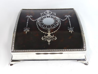 Lot 2121 - An Edwardian silver and tortoiseshell table...