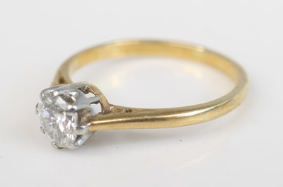 Lot 2233 - A yellow and white metal diamond solitaire...
